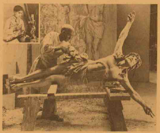 Rudolph Vargas working on a wooden statue of the crucifix.